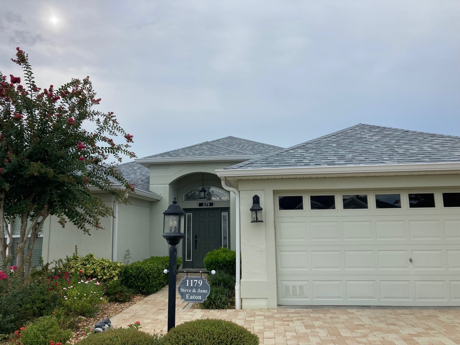 Freshly installed white seamless gutters on a Central Florida home